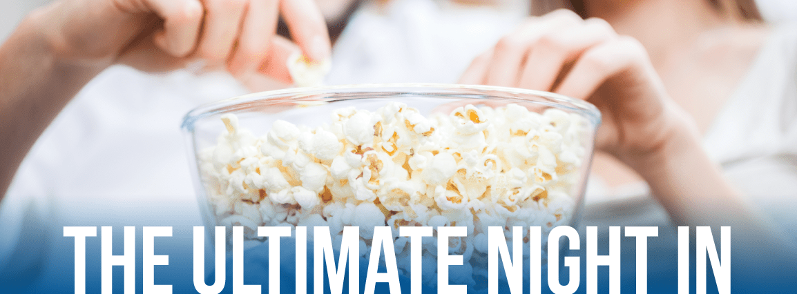 Couple eating popcorn during the ultimate night in