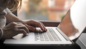 Woman on laptop computer.