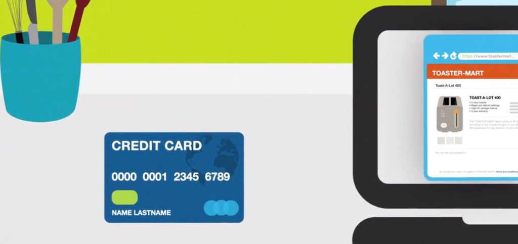 Illustration of credit card next to computer.