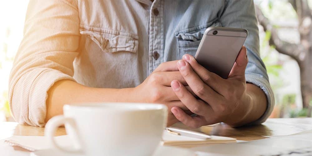 Man looking at smartphone